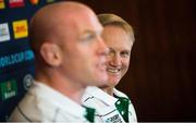 17 September 2015; Ireland head coach Joe Schmidt watches his captain Paul O'Connell answer questions during an Ireland team press conference. Marriott Hotel, Cardiff, Wales. Picture credit: Brendan Moran / SPORTSFILE