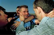 17 September 1995; Charlie Redmond of Dublin, celebrates with supporters after the All Ireland Final match between Dublin and Tyrone at Croke Park in Dublin. Photo by Ray McManus/SPORTSFILE