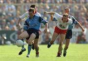 17 September 1995; Mick Deegan of Dublin in action against Feargal Logan of Tyrone during the GAA Football All-Ireland Senior Championship Final match between Dublin and Tyrone at Croke Park in Dublin. Photo by Ray McManus/Sportsfile