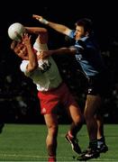 17 September 1995, Seamus McCallan of Tyrone in action against Dessie Farrell of Dublin during the GAA Football All-Ireland Senior Championship Final match between Dublin and Tyrone at Croke Park in Dublin. Photo by Ray McManus/Sportsfile