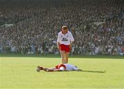 17 September 1995; Fay Devlin of Tyrone approaches team-mate Peter Canavan after losing their 1995 All Ireland Senior Football Final match between Dublin and Tyrone at Croke Park in Dublin. Photo by Ray McManus/SPORTSFILE