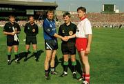 17 September 1995; Dublin captain John O'Leary shakes hands with Ciaran Corr of Tyrone in the presence of referee Paddy Russell before the 1995 All Ireland Senior Football Final match between Dublin and Tyrone at Croke Park in Dublin. Photo by Ray McManus/SPORTSFILE