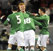 31 March 2009; Northern Ireland's Christopher Casement, centre, is congratulated by team-mates Craig Cathcart, James McClean and Josh McQuaid after scoring his side's equalising goal. U21 International Friendly, Northern Ireland U21 v Ukraine U21, Shamrock Park, Portadown, Co. Armagh. Picture credit: Oliver McVeigh / SPORTSFILE