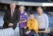 2 April 2009; At the launch of two new hurling themed young people's programmes for RTE, from left, Christy Cooney, President Elect of the GAA, Sadhbh O'Connor, 12, from Garryvoe, Co. Cork, Colm Fitzgerald, 12, son of Waterford manager Davy Fitzgerald, from Ennis, Co. Clare, and Cork camogie star Mary O'Connor. C'mon Caman is a new series for RTE Two and involves 6 of Ireland's leading hurlers and camogie players as they mentor 24 young people from all over in an innovative new sporting challenge. The mentors are Eoin Larkin of Kilkenny, Shane McGrath of Tipperary, Ollie Moran of Limerick, Eoin Kelly of Waterford, Brendan Cummins of Tipperary and Mary O'Connor, of Cork. Ballybradden is a new 20 part animated series following the lives of the 5th class children of Ballybradden Primary School and promises to be one of the world's first animates soaps for younger viewers. Croke Park, Dublin. Picture credit: Brendan Moran / SPORTSFILE *** Local Caption ***