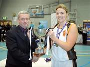 28 March 2009; Louise Harte, Sligo All Stars, is presented with the Women's Division One trophy by Timmy Murphy, Competitions Chairman, Basketball Ireland. Basketball Ireland’s Women’s Division One Final, Sligo All Stars v Scruffy St. Paul’s, Aura Complex, Letterkenny, Co. Donegal. Picture credit: Brendan Moran / SPORTSFILE