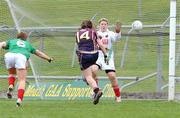1 April 2009; Eva Hicks, Loreto College, scores the fourth goal against St Leo’s despite the efforts of Grace Miller, 6, and goalkeeper Ciara Moore. Pat The Baker Post Primary Schools All-Ireland Junior A Final, Loreto College, Omagh v St Leo’s, Carlow, Pairc Tailteann, Navan, Co. Meath. Picture credit: Matt Browne / SPORTSFILE