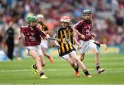 6 September 2015; Eimear Maguire, St. Columba’s, Kilrea, Co. Derry, representing Kilkenny, in action against Caoimhe Cliffe, Bunscoil Bhóthar na Naomh, Lismore, Co. Waterford, representing Galway, during the Cumann na mBunscol INTO Respect Exhibition Go Games 2015 at Kilkenny v Galway - GAA Hurling All-Ireland Senior Championship Final. Croke Park, Dublin. Picture credit: Stephen McCarthy / SPORTSFILE