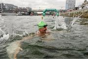 19 September 2015; Tony O'Shields with a celebratory splash after winning the Dublin City Liffey Swim. Dublin City Liffey Swim. Dublin. Picture credit: Cody Glenn / SPORTSFILE