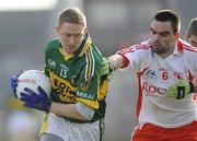 15 February 2009; Colm Cooper, Kerry, in action against Ryan McMenamin, Tyrone. Allianz National Football League, Division 1, Round 2, Tyrone v Kerry, Healy Park, Omagh, Co. Tyrone. Picture credit: Oliver McVeigh / SPORTSFILE