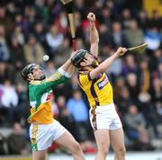 5 April 2009; Shane Dooley, Offaly, in action against David O'Connor, Wexford. Allianz GAA NHL Division 2 Round 6, Wexford v Offaly, Wexford Park, Wexford. Picture credit: Matt Browne / SPORTSFILE