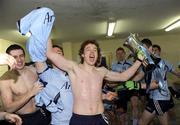 5 April 2009; Dublin's Colin Moore celebrates with the cup in the dressing room after the game. Cadbury Leinster U21 Football Championship Final, Laois v Dublin, O'Moore Park, Portlaoise, Co. Laois. Photo by Sportsfile