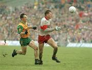 18 July 1993; Derry's Anthony Tohill in action against Donegal's Joyce McMullan. Ulster Senior Football Championship Final, Derry v Donegal, St. Tighearnach's Park, Clones, Co. Monaghan. Picture credit; Ray McManus / SPORTSFILE
