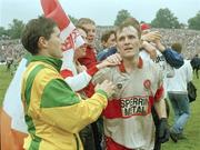 18 July 1993; Donegal's James McHugh, left, and Derry's John McGurk shake hands after the final whistle. Ulster Senior Football Championship Final, Derry v Donegal, St. Tighearnach's Park, Clones, Co. Monaghan. Picture credit; Ray McManus / SPORTSFILE