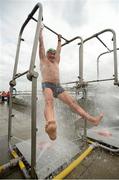 19 September 2015; Dave Duggan, from Clondalkin, Co. Dublin, showers off after taking part in the Dublin City Liffey Swim. Dublin City Liffey Swim. Dublin. Picture credit: Cody Glenn / SPORTSFILE