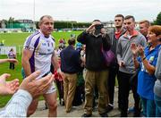 19 September 2015; Kilmacud Crokes captain Pat Burke makes his way to the collect the cup after the game. FBD7s Senior All Ireland Football 7s at Kilmacud Crokes, Final, Kilmacud Crokes, Dublin, v Truagh Gaels, Monaghan. Glenalbyn House, Stillorgan, Co. Dublin. Picture credit: Piaras Ó Mídheach / SPORTSFILE