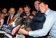 19 September 2015; Trainer and breeder Liam Dowling, centre with trophy, and the winning connections of Ballymac Matt after winning The Final of the 2015 Boylesports Irish Greyhound Derby. Boylesports Irish Derby Final. Shelbourne Park, Dublin. Picture credit: Cody Glenn / SPORTSFILE