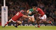 19 September 2015; Ian Madigan, Ireland, is tackled by Jamie Cudmore, left, and Djustice Sears-Duru, Canada. 2015 Rugby World Cup, Pool D, Ireland v Canada. Millennium Stadium, Cardiff, Wales. Picture credit: Stephen McCarthy / SPORTSFILE