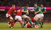 19 September 2015; Iain Henderson, Ireland, is tackled by Aaron Carpenter, Canada. 2015 Rugby World Cup, Pool D, Ireland v Canada. Millennium Stadium, Cardiff, Wales. Picture credit: Stephen McCarthy / SPORTSFILE
