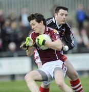 22 March 2009; Michael Meehan, Galway, in action against John Deighan, Derry. Allianz GAA National Football League, Division 1, Round 5, Derry v Galway, Glen pitch, Maghera, Co. Derry. Picture credit: Oliver McVeigh / SPORTSFILE *** Local Caption ***