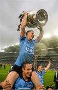 20 September 2015; Philip McMahon, Dublin, celebrates with the Sam Maguire cup on the shoulders of team-mate Tomas Brady after the game. GAA Football All-Ireland Senior Championship Final, Dublin v Kerry, Croke Park, Dublin. Photo by Sportsfile