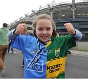 20 September 2015; Kate Grennan, aged 9, from Cabinteely, Co. Dublin, but her mother is from Miltown, Co. Kerry, has divided loyalties on her way to the game. GAA Football All-Ireland Senior Championship Final, Dublin v Kerry, Croke Park, Dublin. Picture credit: Dáire Brennan / SPORTSFILE