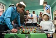 21 September 2015; Dublin's Bernard Brogan with Dylan Muprhy, age 6, from Clondalkin, Co. Dublin, during a visit from the GAA Football All-Ireland Champions Dublin to Our Lady's Children's Hospital, Crumlin, Dublin. Picture credit: David Maher / SPORTSFILE