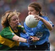20 September 2015; Maeve Greene, Durrow NS, Tullamore, Offaly,  representing Dublin, and Therése Kinnevey, St Annin's NS, Rosscahill, Galway, representing Kerry, during the Cumann na mBunscol INTO Respect Exhibition Go Games 2015 at the GAA Football All-Ireland Senior Championship Final between Dublin and Kerry at Croke Park, Dublin. Picture credit: Stephen McCarthy / SPORTSFILE