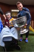 21 September 2015; Dublin's Jonny Cooper with 6 year Dean Fallon, from Ballinasloe, Co. Galway, during a visit from the GAA Football All-Ireland Champions Dublin to Our Lady's Children's Hospital, Crumlin, Dublin. Picture credit: David Maher / SPORTSFILE