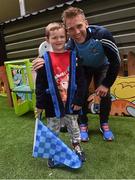 21 September 2015; Dublin's Jonny Cooper with 6 year old Thomas Kearney, from Ballyfermot, Co. Dublin, during a visit from the GAA Football All-Ireland Champions Dublin to Our Lady's Children's Hospital, Crumlin, Dublin. Picture credit: David Maher / SPORTSFILE