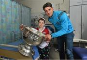 21 September 2015; Dublin's Bernard Brogan meets 7 year-old Shane Carroll, from Westmeath, during a visit from the GAA Football All-Ireland Champions Dublin to Temple Street Children’s Hospital. Temple Street, Dublin. Picture credit: Ramsey Cardy / SPORTSFILE
