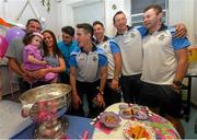 21 September 2015; Dublin player, from left, Bernard Brogan, Brian Fenton, Philly McMahon, Denis Bastick and Jack McCaffrey sing happy birthday to Ava Finn, from Sligo, on her 3rd birthday during a visit from the GAA Football All-Ireland Champions Dublin to Temple Street Children’s Hospital. Temple Street, Dublin. Picture credit: Ramsey Cardy / SPORTSFILE