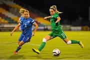 21 September 2015; Julie Russell, Republic of Ireland, takes a shot after evading the attention of Tuija Hyyrynen, Finland. UEFA Women's EURO 2017 Qualifier Group 2, Republic of Ireland v Finland. Tallaght Stadium, Tallaght, Co. Dublin. Picture credit: Seb Daly / SPORTSFILE