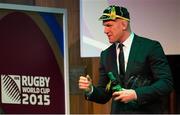 21 September 2015; Ireland captain Paul O'Connell leaves the stage after being presented with a beer glass and a bottle of Shamrock Stout during the Ireland Squad Rugby World Cup Official Welcome Ceremony. Ireland Welcome Ceremony, 2015 Rugby World Cup, Burton Town Hall, Burton-upon-Trent, England. Picture credit: Brendan Moran / SPORTSFILE