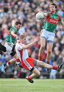 12 April 2009; Ronan McGarrity, right, and Mark Ronaldson, Mayo, in action against Kevin Hughes, Tyrone. Allianz GAA National Football League, Division 1, Round 7, Mayo v Tyrone, McHale Park, Castlebar, Co. Mayo. Picture credit: David Maher / SPORTSFILE *** Local Caption ***