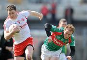 12 April 2009; Enda McGinley, Tyrone, in action against Patrick Harte, Mayo. Allianz GAA National Football League, Division 1, Round 7, Mayo v Tyrone, McHale Park, Castlebar, Co. Mayo. Picture credit: David Maher / SPORTSFILE *** Local Caption ***