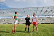 12 April 2009; Referee Pat McEnaney tosses the coin between captains Ronan McGarrity, Mayo, and Ryan McMenamin, Tyrone. Allianz GAA National Football League, Division 1, Round 7, Mayo v Tyrone, McHale Park, Castlebar, Co. Mayo. Picture credit: David Maher / SPORTSFILE *** Local Caption ***
