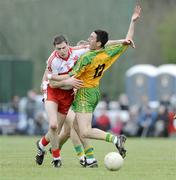 12 April 2009; Rory Kavanagh, Donegal, in action against Enda Muldoon, Derry. Allianz GAA National Football League, Division 1, Round 7, Derry v Donegal, Maghera, Co. Derry. Picture credit: Oliver McVeigh / SPORTSFILE *** Local Caption ***