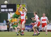 12 April 2009; Brendan Boyle, Donegal, in action against Patsy Bradley, Derry. Allianz GAA National Football League, Division 1, Round 7, Derry v Donegal, Maghera, Co. Derry. Picture credit: Oliver McVeigh / SPORTSFILE *** Local Caption ***