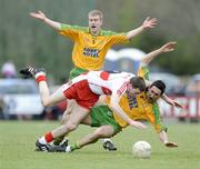 12 April 2009; Rory Kavanagh, Donegal, in action against Enda Muldoon, Derry. Allianz GAA National Football League, Division 1, Round 7, Derry v Donegal, Maghera, Co. Derry. Picture credit: Oliver McVeigh / SPORTSFILEE *** Local Caption ***
