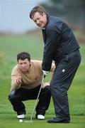 15 April 2009; Ireland's first ever golf podcast was launched today by the title sponsor of the Irish Open, 3. Presented by Golf commentator Shane O'Donoghue pictured here lining up a putt on the 9th green with  Robert Finnigan, Chief Executive of 3, during the 3 Media Day at Co. Louth Golf Club, Baltray, Co. Louth. Picture credit: Matt Browne / SPORTSFILE