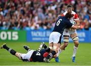 23 September 2015; Luke Thompson, Japan, is tackled by Grant Gilchrist, left, and Ryan Wilson, Scotland. 2015 Rugby World Cup, Pool B, Scotland v Japan. Kingsholm Stadium, Gloucester, England. Picture credit: Ramsey Cardy / SPORTSFILE