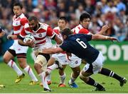 23 September 2015; Michael Leitch, Japan, is tackled by Ryan Wilson, Scotland. 2015 Rugby World Cup, Pool B, Scotland v Japan. Kingsholm Stadium, Gloucester, England. Picture credit: Ramsey Cardy / SPORTSFILE