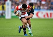23 September 2015; Harumichi Tatekawa, Japan, is tackled by WP Nel, Scotland. 2015 Rugby World Cup, Pool B, Scotland v Japan. Kingsholm Stadium, Gloucester, England. Picture credit: Ramsey Cardy / SPORTSFILE
