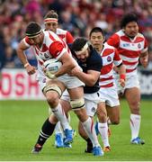 23 September 2015; Luke Thompson, Japan, is tackled by Alasdair Dickinson, Scotland. 2015 Rugby World Cup, Pool B, Scotland v Japan. Kingsholm Stadium, Gloucester, England. Picture credit: Ramsey Cardy / SPORTSFILE