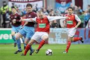 17 April 2009; Mark Quigley, St Patrick's Athletic, in action against Paul Crowley, Drogheda United. League of Ireland Premier Division, St Patrick's Athletic v Drogheda United, Richmond Park, Dublin. Picture credit: Brian Lawless / SPORTSFILE