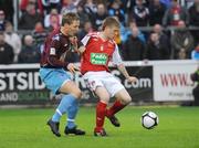 17 April 2009; Andy Haran, St Patrick's Athletic, in action against Ian Ryan, Drogheda United. League of Ireland Premier Division, St Patrick's Athletic v Drogheda United, Richmond Park, Dublin. Picture credit: Brian Lawless / SPORTSFILE
