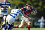 18 April 2009; Sean Treacy, Clontarf, is tackled by Richard McCarter, Dungannon. AIB League Division 1, Clontarf v Dungannon, Castle Avenue, Clontarf, Dublin. Photo by Sportsfile