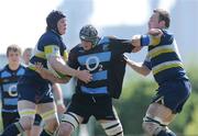 18 April 2009; Fergal Walsh, Shannon, is tackled by Chris Rowe, left, and Dave Harty, Dolphin. AIB Leaue Division 1, Shannon v Dolphin, Coonagh, Limerick. Picture credit: Diarmuid Greene / SPORTSFILE