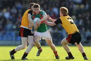 18 April 2009; Neill Douglas, Mayo, in action against Joseph Murphy, left, and Niall Higgins, Down. Cadbury Under 21 All-Ireland Football Championship Semi-Final, Mayo v Down, Pearse Park, Longford. Picture credit: Pat Murphy / SPORTSFILE