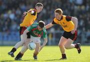 18 April 2009; Neill Douglas, Mayo, in action against Joseph Murphy, left, and Niall Higgins, Down. Cadbury Under 21 All-Ireland Football Championship Semi-Final, Mayo v Down, Pearse Park, Longford. Picture credit: Pat Murphy / SPORTSFILE